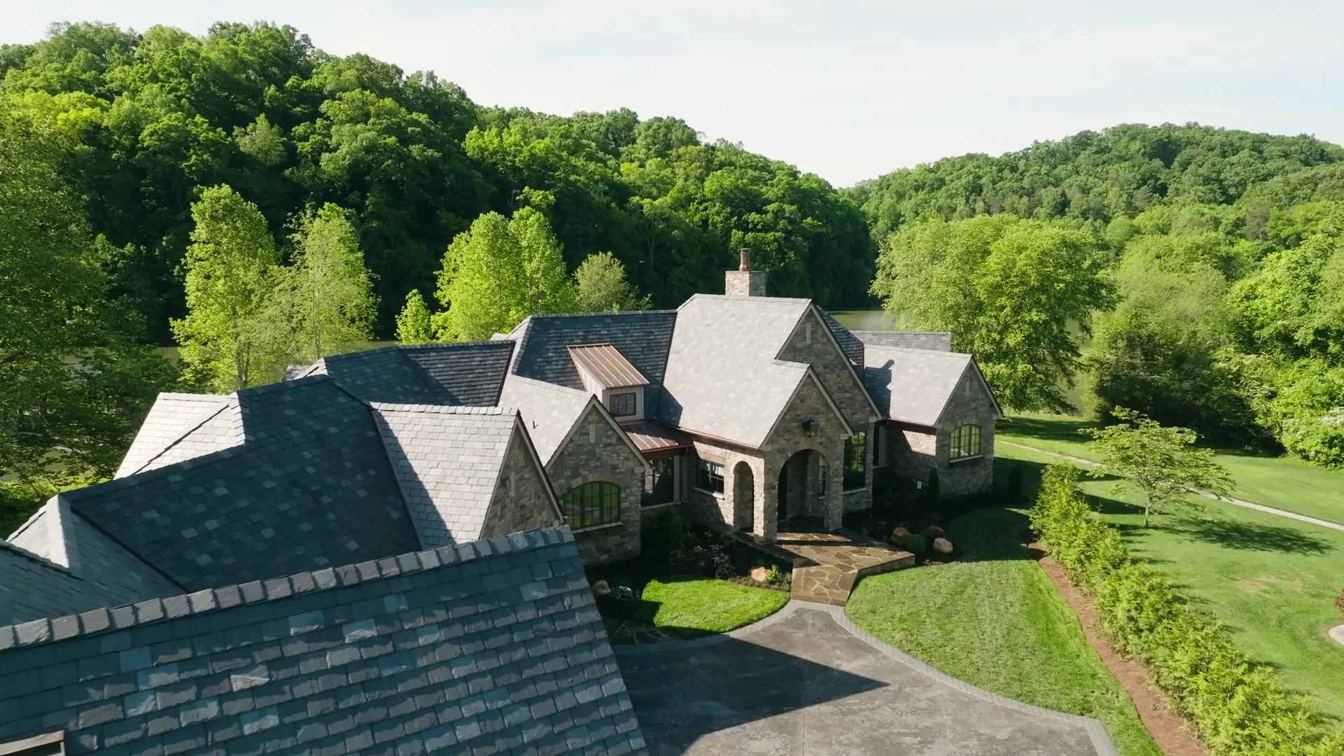Aerial view of a Biles custom home among the trees