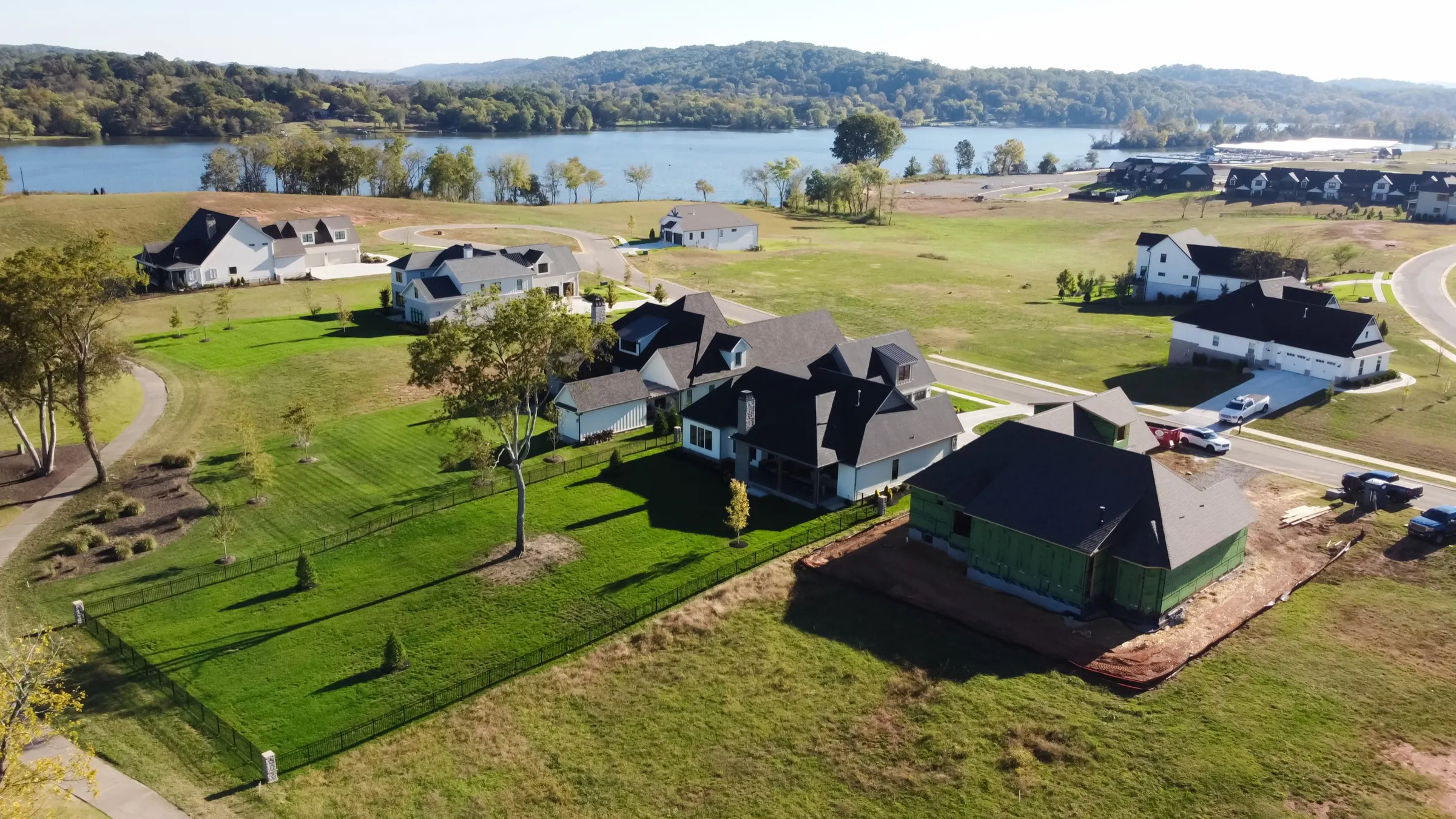 Aerial view of the Fairway Residence beside the lake