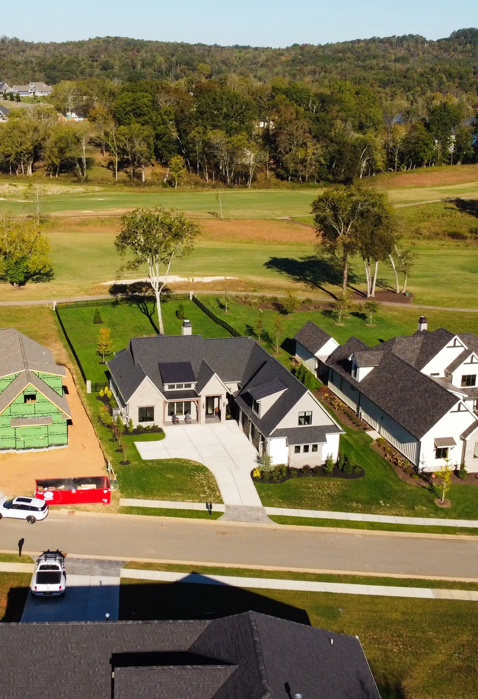 Aerial view of the Fairway Residence roofline and landscape