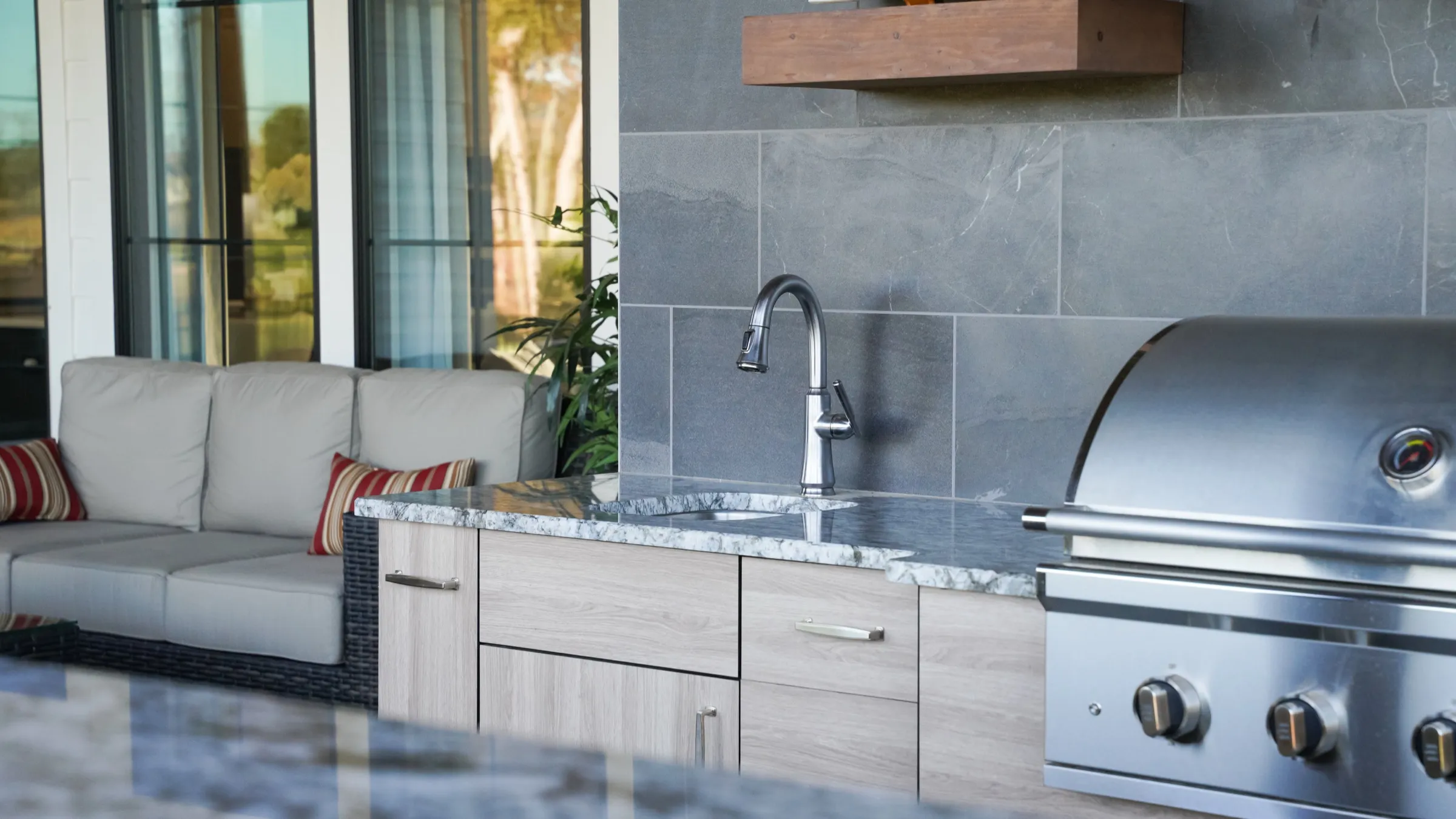 Outdoor kitchen and bar seating